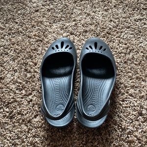 Black Crocs Flats
